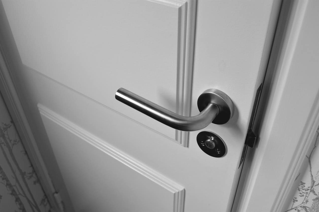 door pin vs traditional lock
